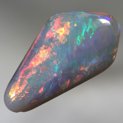 SOLID SEMI BLACK OPAL Bright reds roll over green and blue. SEE VIDEO